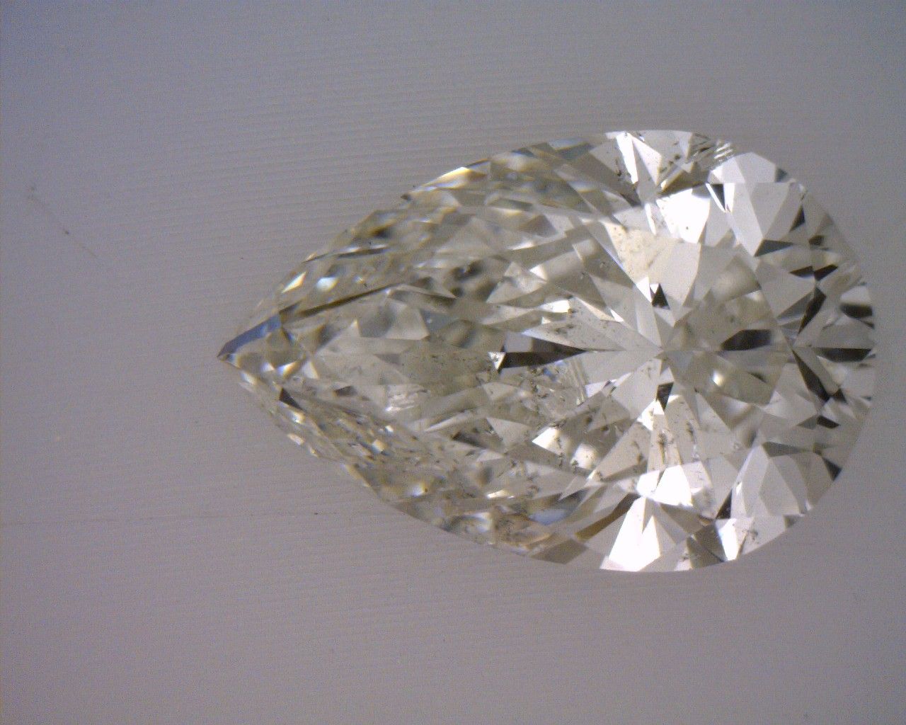 Diamond Natural 0,9Ct J-SI2 Pear - GIA1387576699 1